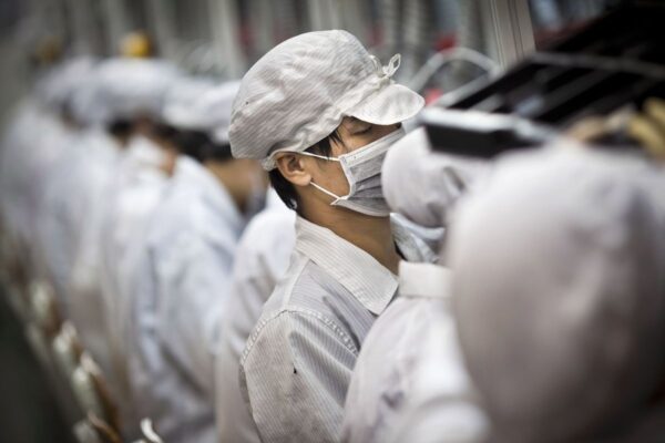 Droves of workers flee Covid-hit lockdown at China’s iPhone factory in Zhengzhou